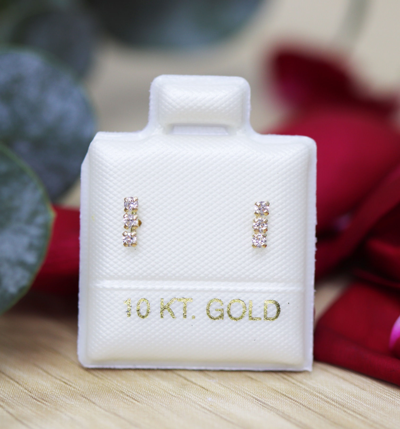 BOC357 Broquel Oro 10k tresillo vertical mont 1.5 mm