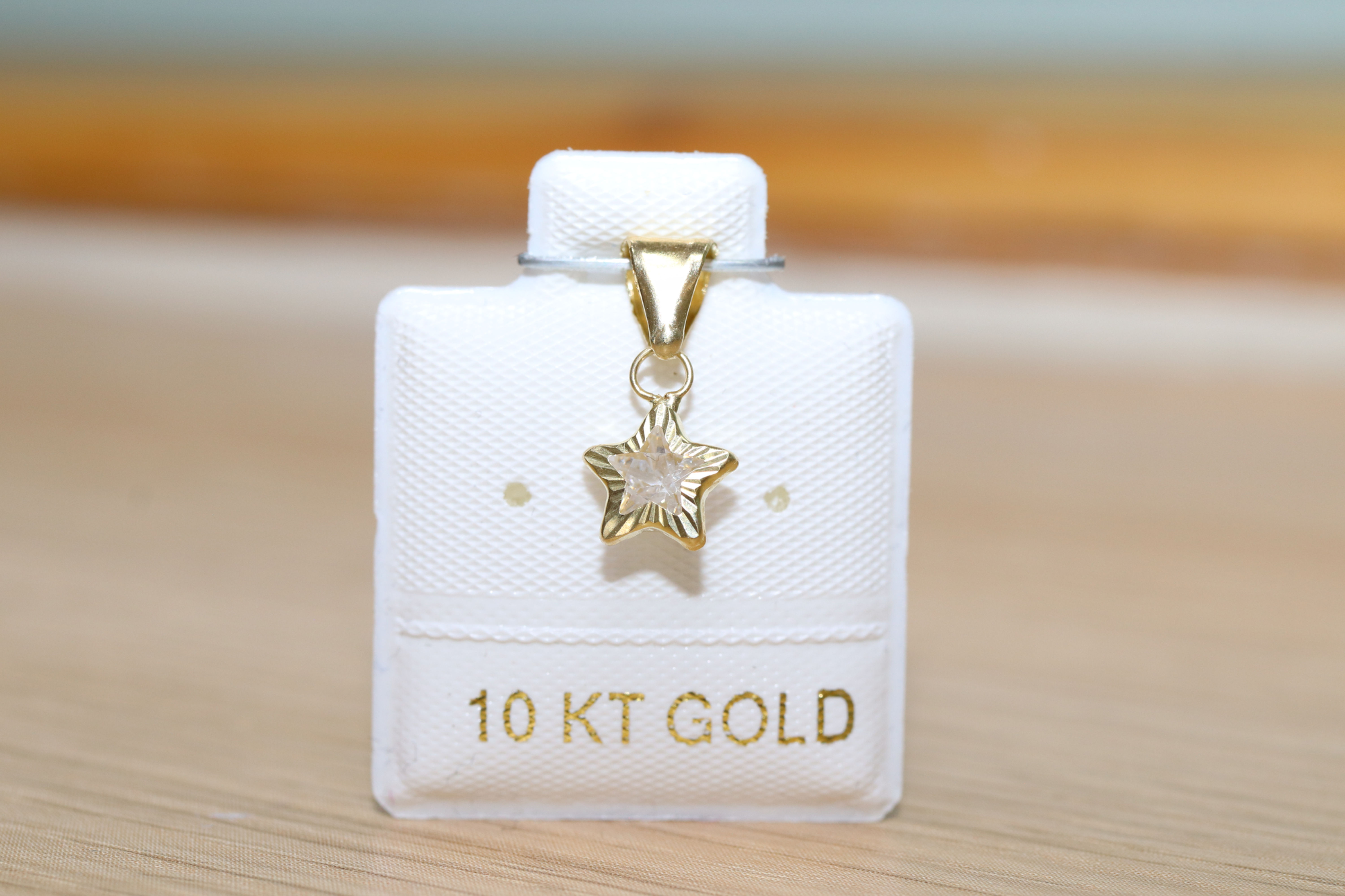 BOC76DB Mini dije Oro 10k Estrellita zirconia blanca