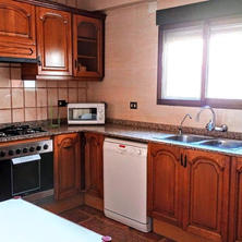 The full kitchen complete with basic kitchenware