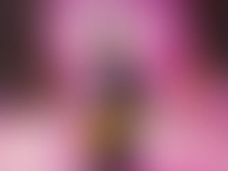 Promotional artwork featuring Prince holding a yellow guitar, dressed in a purple outfit, surrounded by band members with vibrant lighting and the title “Little Red Corvette.