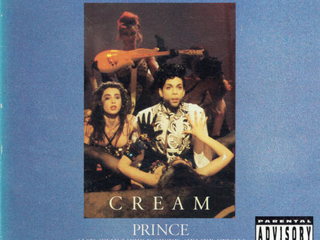 US maxi‑single artwork featuring Prince and NPG performers in dramatic stage‑styled imagery with bold typography for “Cream.”
