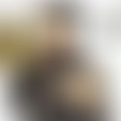 Promotional artwork for Prince’s Welcome 2 America featuring Prince holding a guitar vertically with stylised typography.