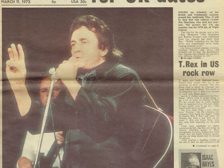 A scanned newspaper front page showing the headline “T. Rex in U.S. rock row,” alongside stories on The Doors and Johnny Cash, with bold typography and early‑’70s newsprint layout.