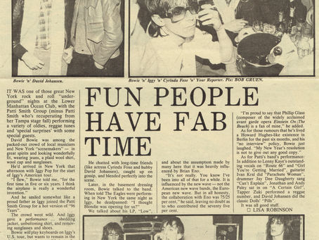 A vintage magazine page featuring three black‑and‑white photographs of David Bowie, Iggy Pop, David Johansen, and Cyrinda Foxe at the Ocean Club in New York, accompanied by an article describing their appearance and the Patti Smith Group’s performance.