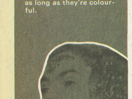 A Popswop PopFax profile featuring a black‑and‑white photo of Dave Hill playing guitar, accompanied by personal details such as age, birthplace, favourite colours, hobbies, and his silver Jensen car.