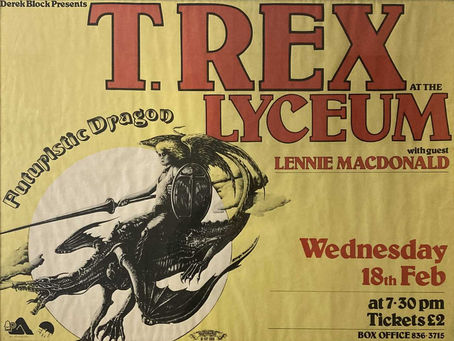 A combined review of T. Rexâs Lyceum Ballroom concert, featuring Marc Bolan in full 1976 stage attire and a giant dragon stage prop.