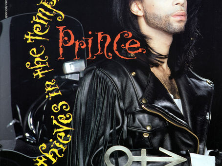 Cover for Prince’s Thieves In The Temple maxi‑single featuring Prince in a black fringed jacket beside a motorcycle, with stylised yellow and red typography.