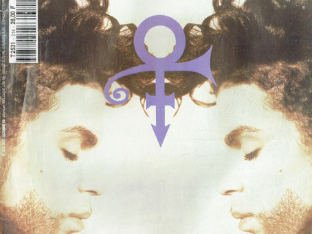 Cover of Rock & Folk magazine, October 1993, featuring mirrored profile portraits of Prince with eyes closed and the Love Symbol between them. The headline reads “Le retour de la marquise atomique!” The purple‑and‑white design includes additional features on Reverend Horton, Crossroads, and Stevie Ray Vaughan.