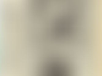 Twoâpage newspaper feature with a photo of Alvin Stardust holding a microphone, a large caricature illustration of him with a mechanical microphone claw, and columns of text exploring his persona, career, and live performance