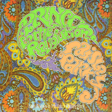 Cover art for Prince and the Revolution’s 1985 single ‘Paisley Park’, featuring psychedelic paisley patterns with stylised green and orange lettering