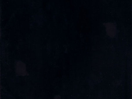 A plain, matte‑black LP sleeve representing Prince’s withdrawn 1987 Black Album, with no text or imagery.