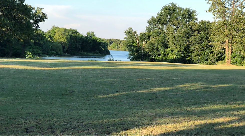 Manicured Green Space with Lake Views at Vassé Rendezvous