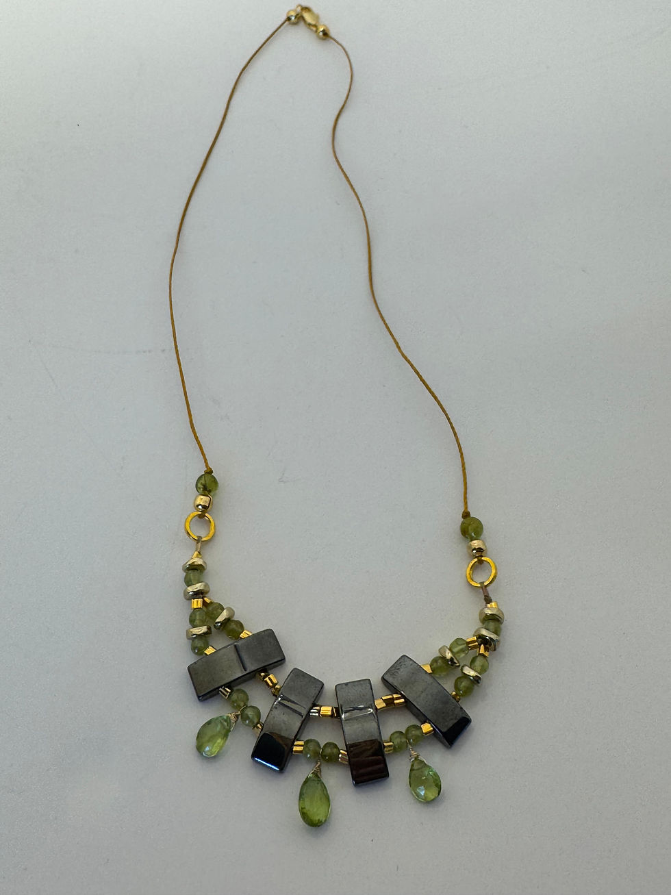 Thumbnail: Peridot & Hematite Festoon Necklace
