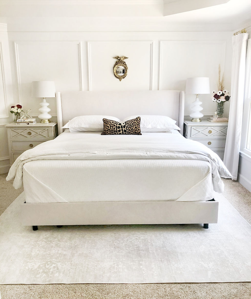 white bedding in short-term rental bedroom showcasing professional hospitality design and linen standards