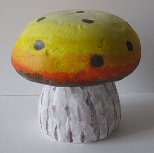 Handcrafted mixed media mushroom sculpture with yellow cap
