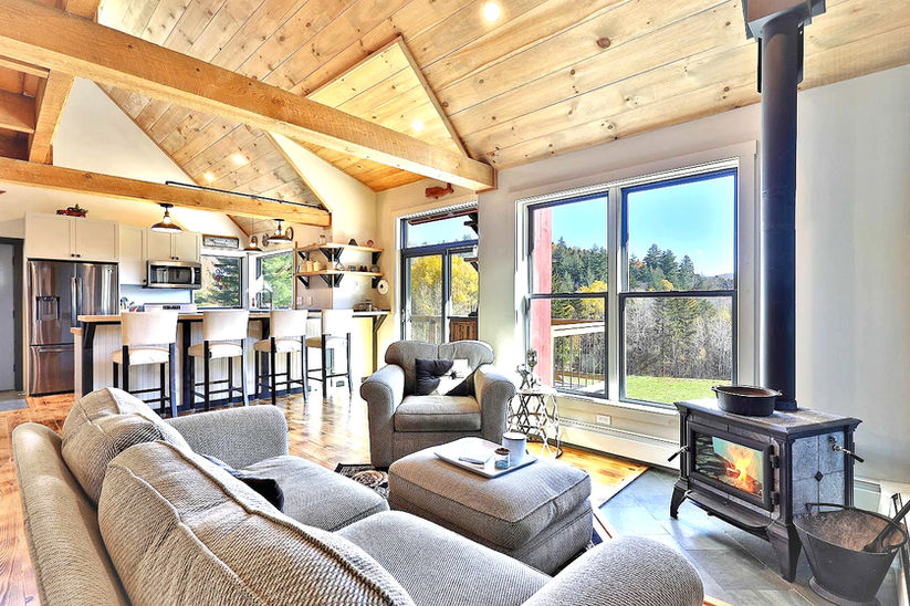 Modern open living room by Killington Vermont home builders