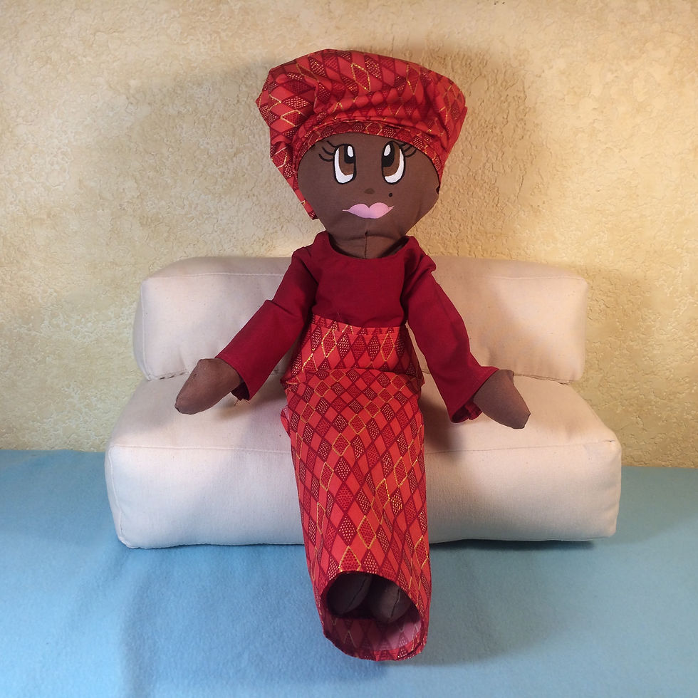 Nigerian rag doll in red dress
