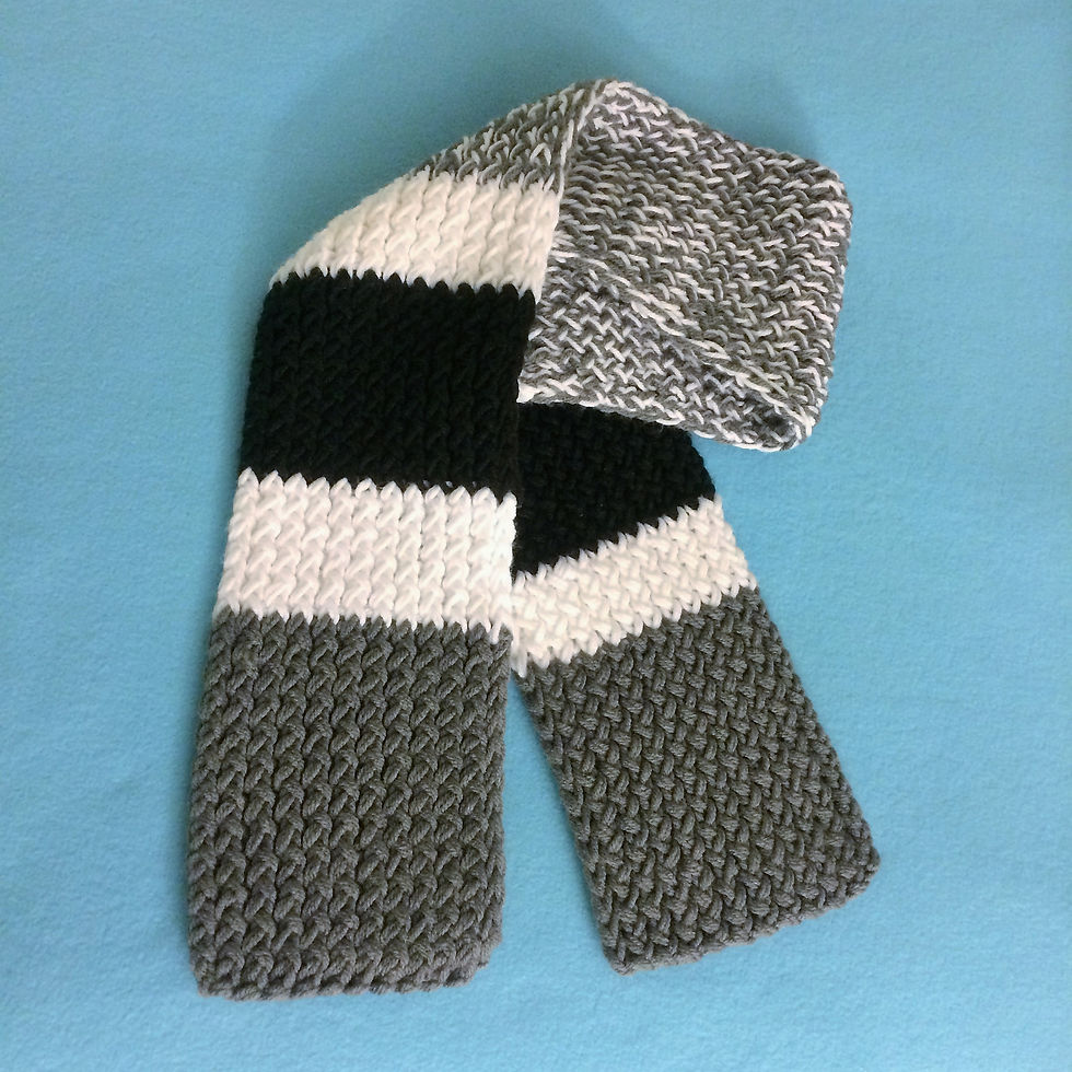 Black, white and grey knitted scarf