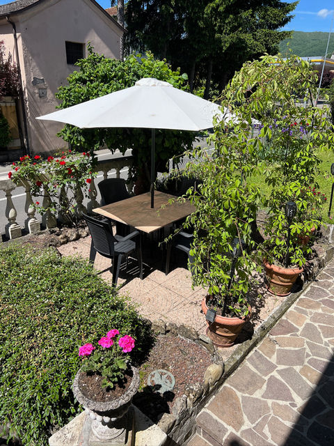 Front of house outdoor seating at Villa Tre Angeli