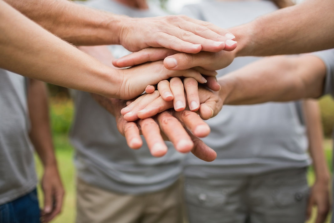 Hands Stacked Together
