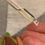 Thumbnail: Pipette with oil serum being dispensed onto open fingers clean, natural background