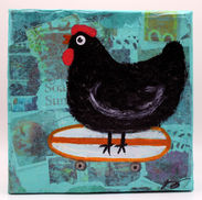 Black chicken standing on skateboard