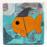 Goldfish wearing a shark fin