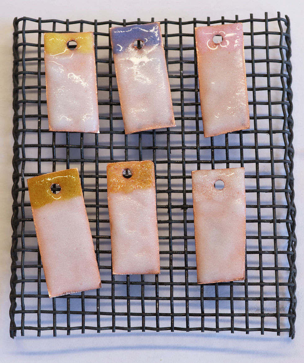 The first layer of coloured enamel and copper flux on my test strips