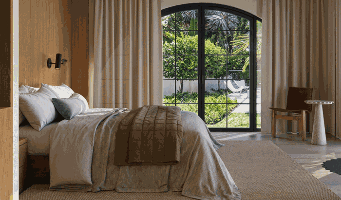 Photorealistic CGI of a luxury bedroom interior designed for high-end residential real estate marketing.