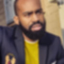 client wearing his custom blazer with logo embroidered