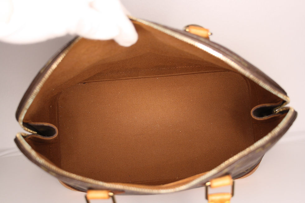 Pikkukuva: Louis Vuitton Monogram Alma Handbag inside view