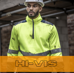 Construction worker wearing Hi-Vis jacket, standing near scaffolding. Embroidered & customised garments for you