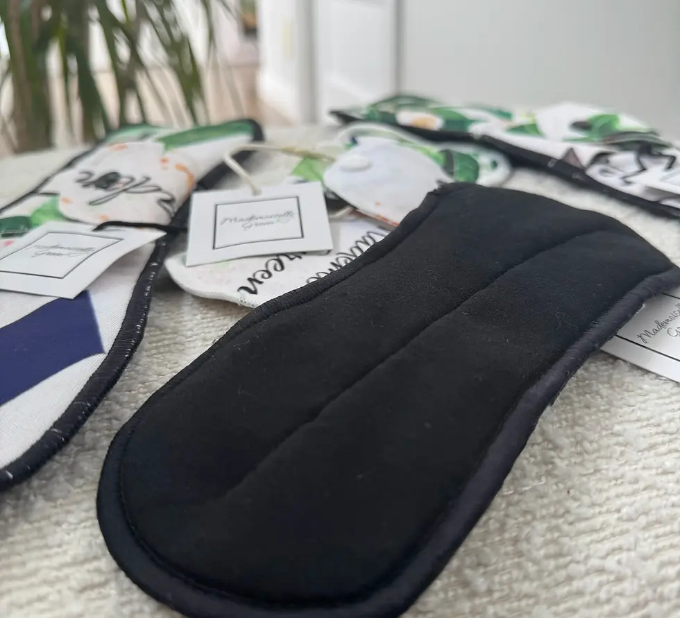 Protège dessous vue du côté absorbant noir en coton bio