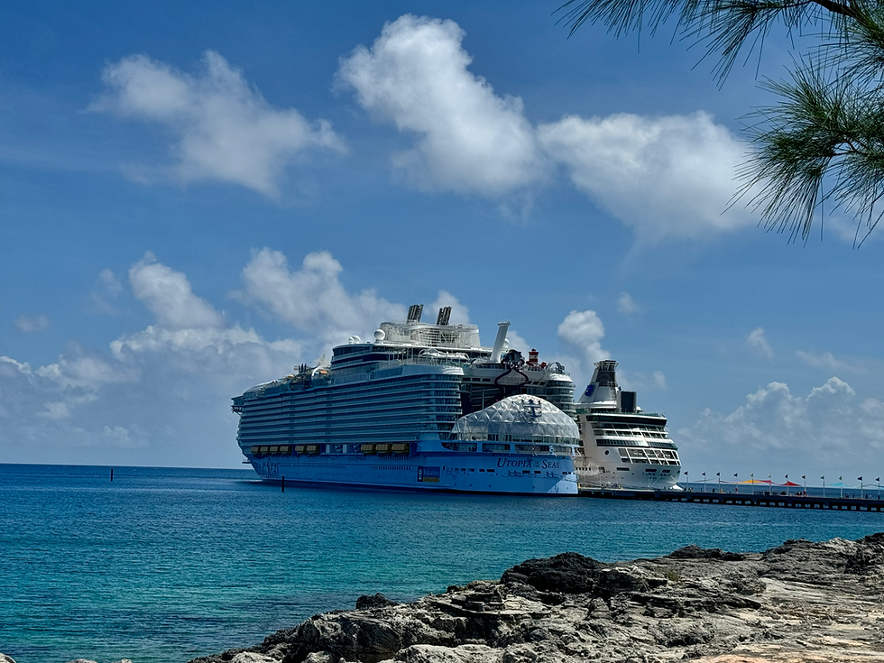 Two Royal Caribbean ships side by side at Perfect Day at CocoCay in the Bahamas