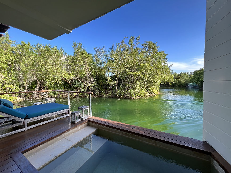 Deluxe overwater lagoon suite at Rosewood Mayakoba