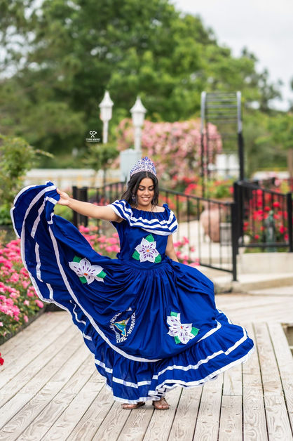 girl in dress dancing at La Hacienda Venue