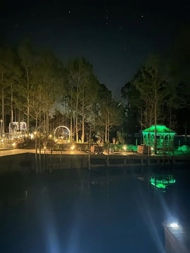 pond at night with lights at La Hacienda Venue