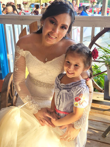 bride with little girl at La Hacienda Venue on Mississippi Gulf Coast