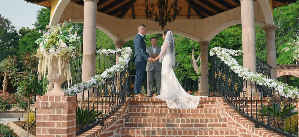 Wedding couple at their outdoor ceremony at El Quiosco del Amor gazebo