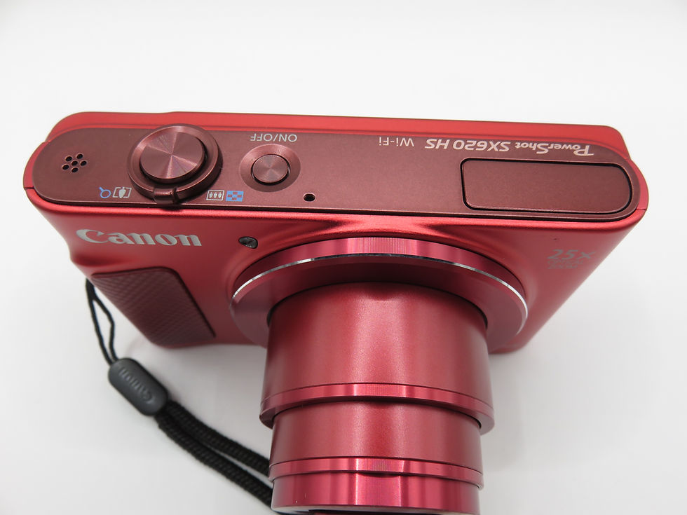 Thumbnail: Canon PowerShot SX620 HS red compact digital camera top view with lens extended