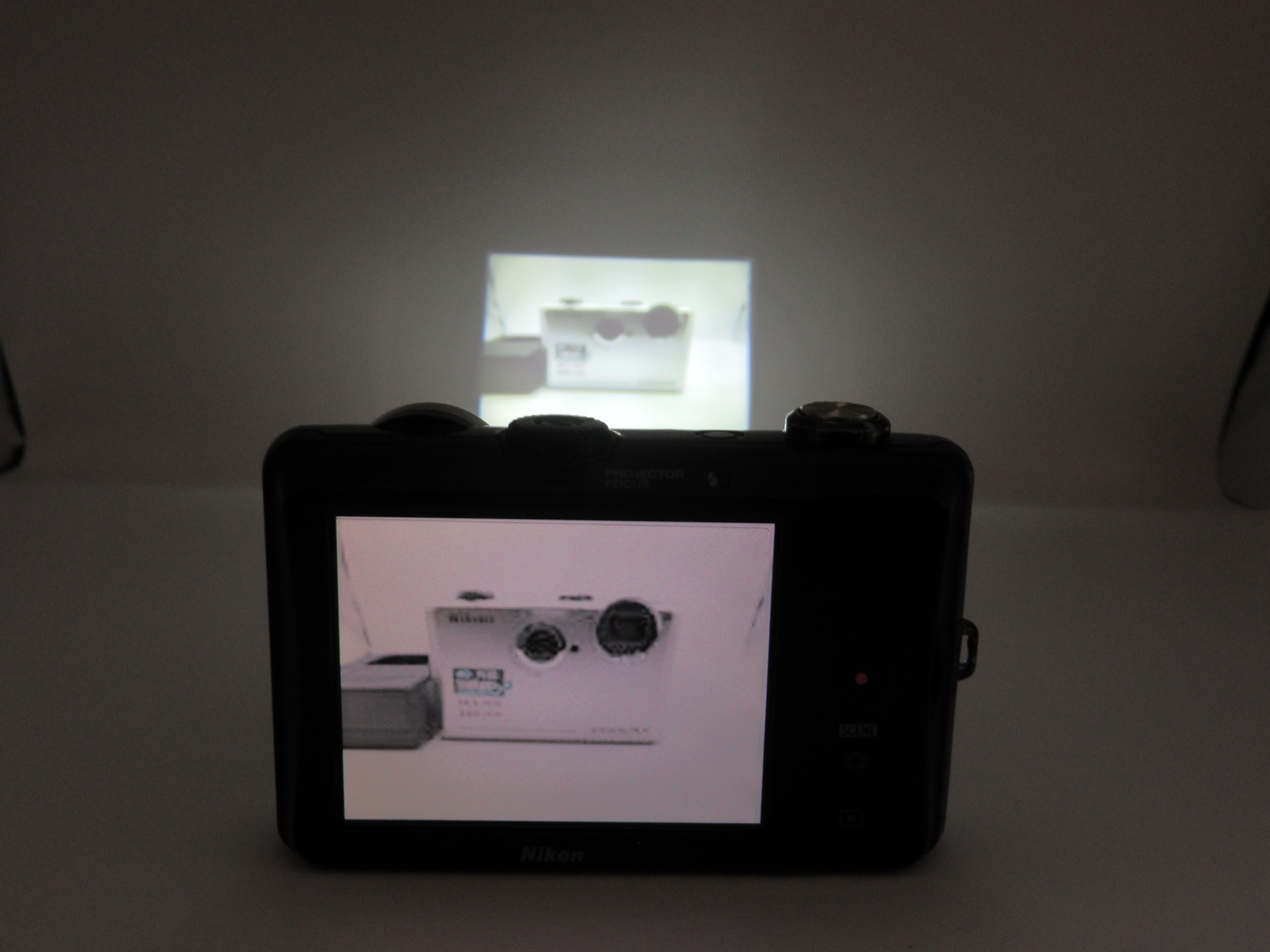 Nikon COOLPIX S1100pj Review | The Compact Camera with a Built-In