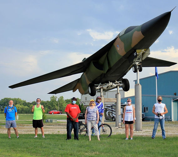 group with plane.smaller.jpeg