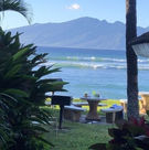 Tables and grills by the ocean