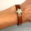 Thumbnail: Tan Leather Skinny with Stunning Gold Star
