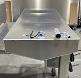 Tapered belly aluminum fuel tank with welded mounting tabs and top access fittings, fabricated in Washington.