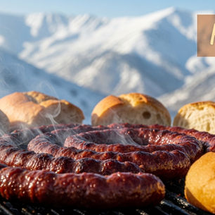 Kartepe sucuk ekmek — karlı dağ manzarasında ızgarada sucuk