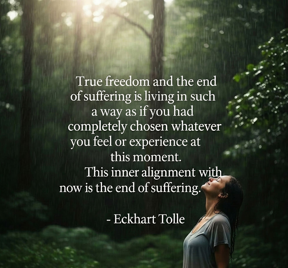 A woman stands in the rain in a lush forest, looking up peacefully. Quote by Eckhart Tolle: "True freedom..." is overlaid in white text.