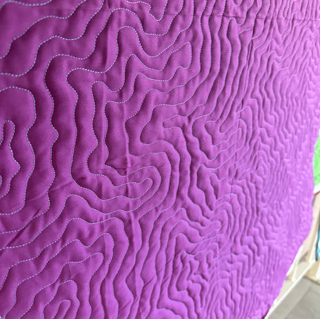 Topography, hand-guided quilting