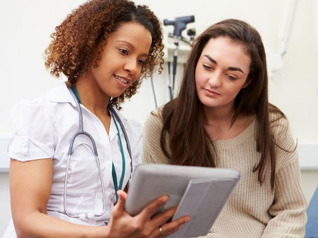 Functional nurse supporting patient understanding of lab results