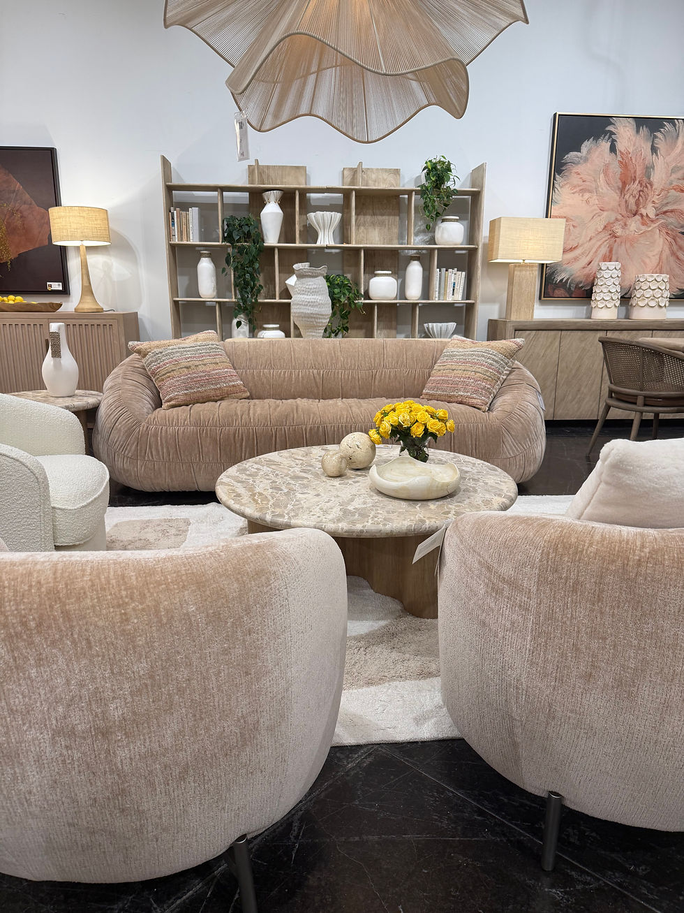 From chairs to sofas to tables, soft curves are taking center stage.
